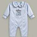 Ice blue silk baby romper with navy piping, an embroidered initial on the Peter Pan collar and a carousel motif with gold canopy at the chest