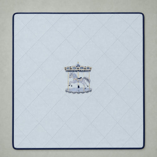 Ice blue silk baby wrapping sheet with navy trim, an embroidered carousel and a name in navy script
